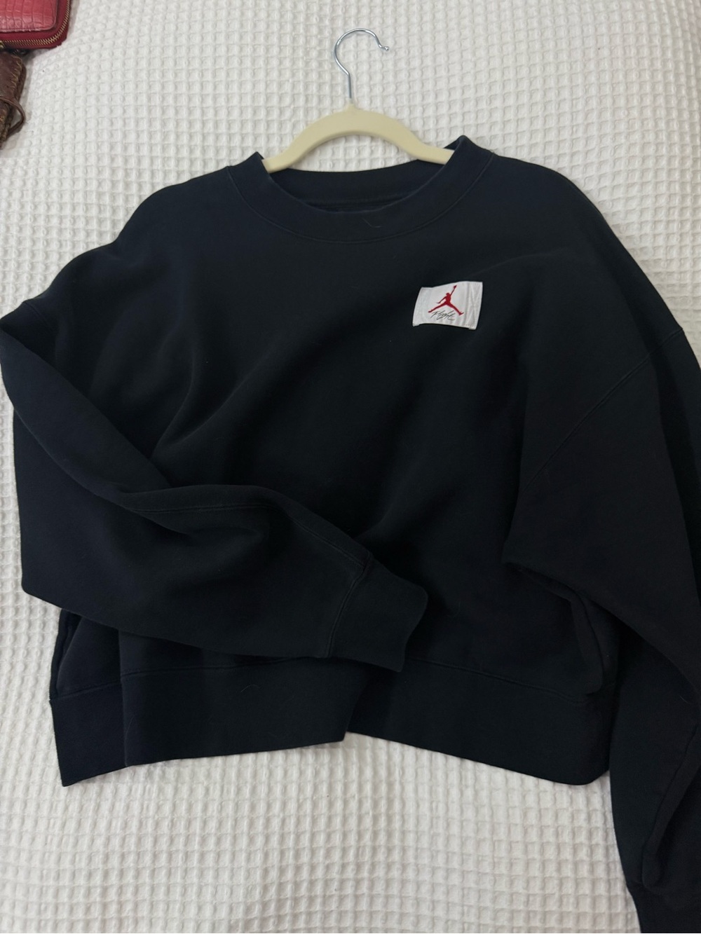 Jordan Black Crewneck Sweatshirt with Red Jumpman Patch